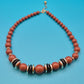 Vintage Statement Kette mit braunen Perlen und eleganten Metall-Akzenten