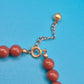 Vintage Statement Kette mit braunen Perlen und eleganten Metall-Akzenten