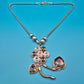 Elegante Vintage Kette mit Blumen- & Herzanhängern in Silberoptik