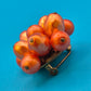 Vintage Cluster-Brosche in leuchtendem Orange - Modeschmuck