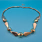 Vintage Statement Kette in Goldoptik mit geometrischen Akzenten