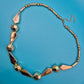 Vintage Statement Kette in Goldoptik mit geometrischen Akzenten