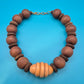 Vintage Statement-Kette Holzperlen mit zentralem Riffel-Element Boho Chic