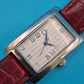 Elegante TCM Armbanduhr in rechteckiger Form mit weinrotem Lederarmband