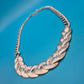 Elegante Vintage Statement-Kette mit geflochtenem Mittelstück Silberfarben