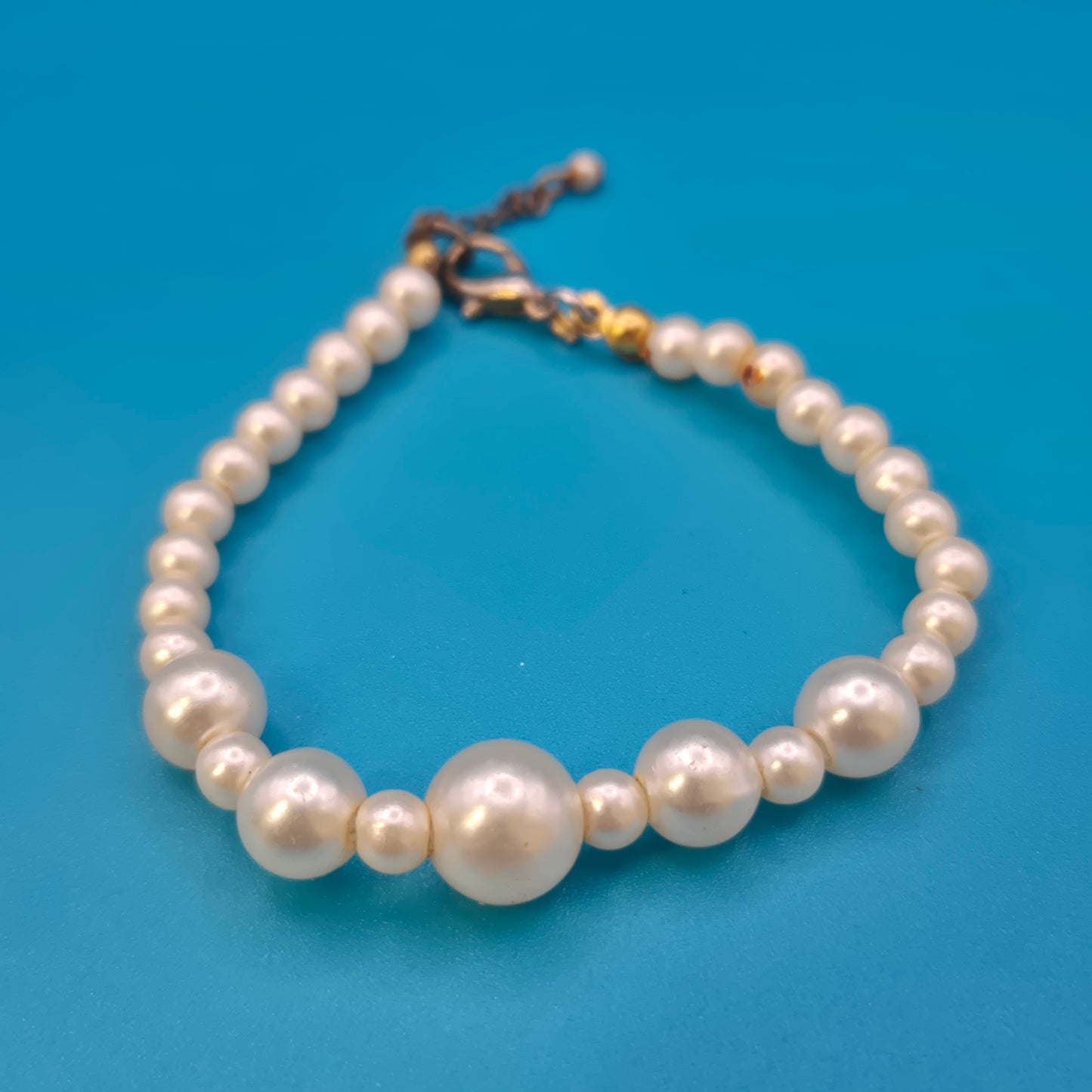 Vintage Perlenarmband mit Größenverlauf und Karabinerverschluss