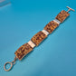 Vintage Armband gewebt mit Glasperlen und Knebelverschluss in Braun-Gold