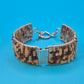 Vintage Armband gewebt mit Glasperlen und Knebelverschluss in Braun-Gold