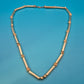 Vintage Goldfarbene Stab-Kette mit Struktur-Elementen
