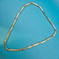 Vintage Goldfarbene Stab-Kette mit Struktur-Elementen