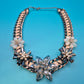 Vintage Statement-Kette mit floralen Kristallen und geflochtenem Band