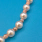 Elegante Vintage Perlenkette mit Akzent-Edelsteinen und Goldverschluss