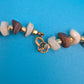 Vintage Muschel-Kette mit braunen Akzenten und Gold-Details