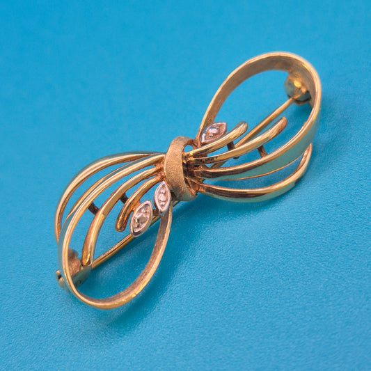 Elegante Vintage-Brosche in Schleifenform mit Zirkonia-Akzenten