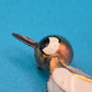 Vintage Vogel-Brosche in Goldoptik mit Emaille-Akzenten und Perlmutt-Optik