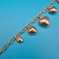 Vintage Roségoldfarbenes Bettelarmband mit Herz-Anhängern