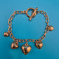Vintage Roségoldfarbenes Bettelarmband mit Herz-Anhängern