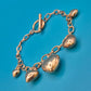 Vintage Roségoldfarbenes Bettelarmband mit Herz-Anhängern