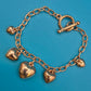 Vintage Roségoldfarbenes Bettelarmband mit Herz-Anhängern