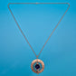 Vintage Statement-Kette mit texturiertem Ring-Anhänger und blauem Cabochon