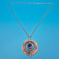 Vintage Statement-Kette mit texturiertem Ring-Anhänger und blauem Cabochon