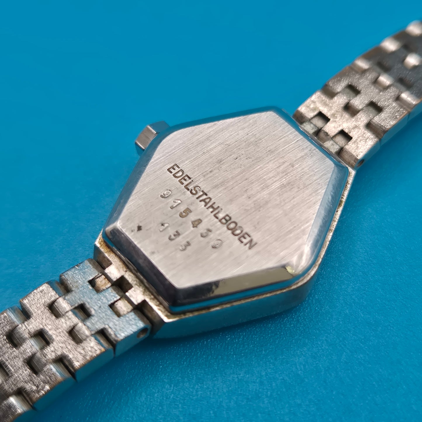 Vintage DUGENA Quartz Damenuhr Sechseck-Gehäuse mit Strukturarmband