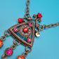 Vintage Statement-Kette mit triangulärem Anhänger und funkelnden Strasssteinen