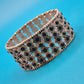 Vintage Stretch-Armband mit schwarzen Schmucksteinen in Antik-Silber-Optik
