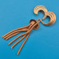 Vintage Goldfarbene Brosche mit Schlangenkettchen-Quaste