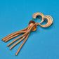 Vintage Goldfarbene Brosche mit Schlangenkettchen-Quaste