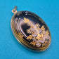 Vintage Medaillon Anhänger schwarz-gold Art Déco Design floral