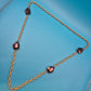 Elegante Vintage Goldfarbene Kette mit facettierten Schmucksteinen