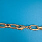 Elegante Vintage Goldfarbene Kette mit facettierten Schmucksteinen