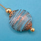 Vintage Hutnadel mit kunstvoll gemusterter Glasperle & Gold-Finish