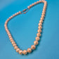 Elegante Vintage Perlenkette mit kunstvoller Schließe – Klassischer Chic
