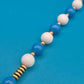 Vintage Perlenkette in Blau und Weiß mit goldenen Akzenten