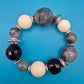 Elegantes Vintage-Statement-Armband mit schwarz-weißen Acrylperlen