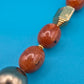 Vintage Statement-Kette mit braunen Glanzperlen und goldenen Akzenten