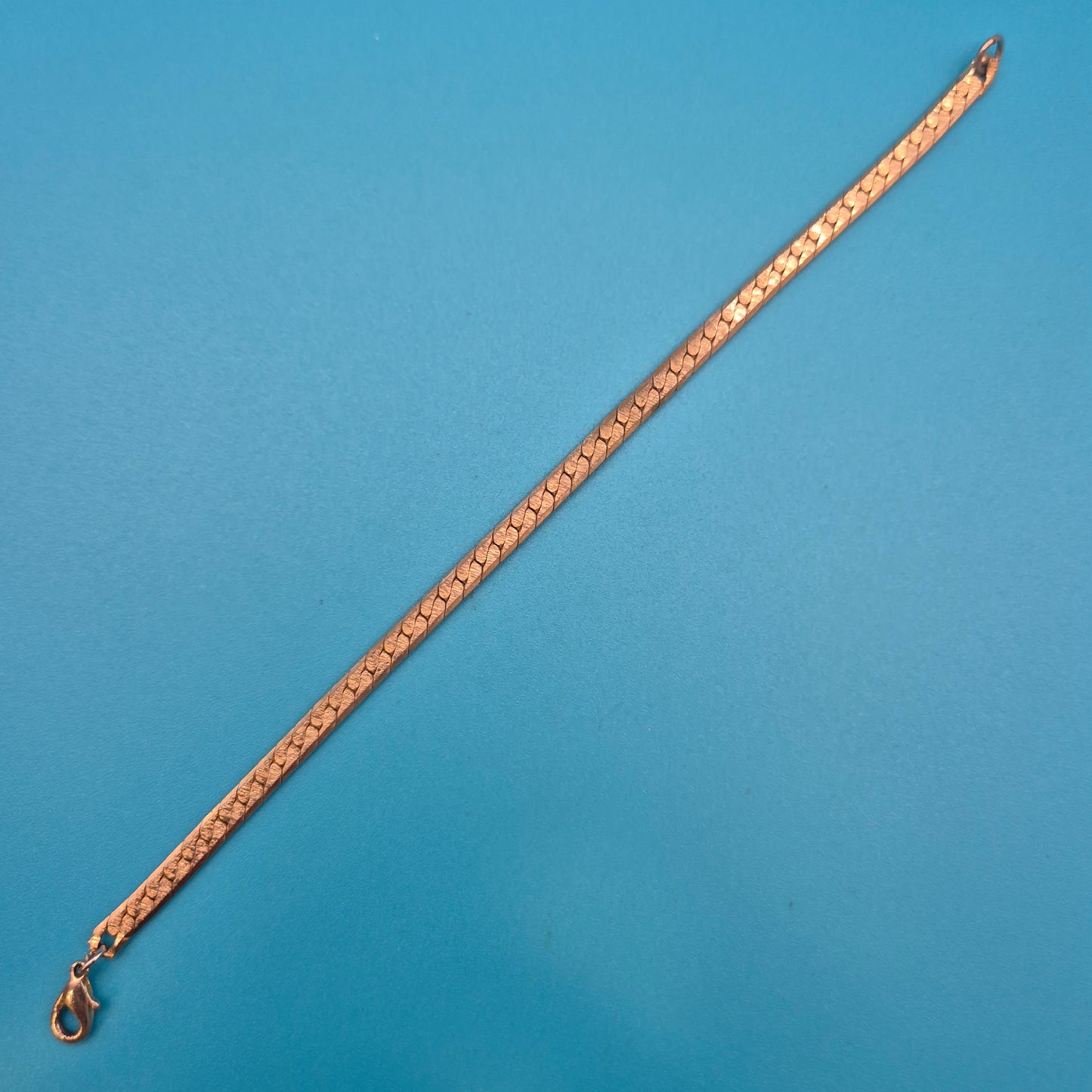 Klassisches flaches Gliederarmband in Roségold-Optik