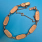 Vintage Armband mit gravierten Metallgliedern und goldenen Ornamenten