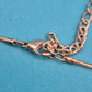 Elegante Vintage Kette mit doppeltem Ring-Anhänger und Strass-Besatz