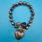 Vintage Stretch-Armband mit Herz-Charms in Anthrazit-Optik