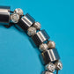 Vintage Stretch-Armband mit silberfarbenen Rosen-Perlen und Metall-Elementen