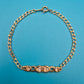 Elegantes Vintage-Armband mit Herz-Elementen und funkelnden Schmucksteinen