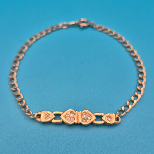 Elegantes Vintage-Armband mit Herz-Elementen und funkelnden Schmucksteinen