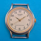 Vintage TOYO Quartz Armbanduhr mit weißem Zifferblatt und arabischen Ziffern