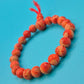 Vintage Armband aus rotem Korallen-Imitat mit dekorativem Knoten-Element