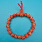 Vintage Armband aus rotem Korallen-Imitat mit dekorativem Knoten-Element