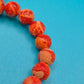 Vintage Armband aus rotem Korallen-Imitat mit dekorativem Knoten-Element