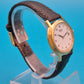 Vintage Seiko Quartz Armbanduhr mit Datumsanzeige und Lederarmband